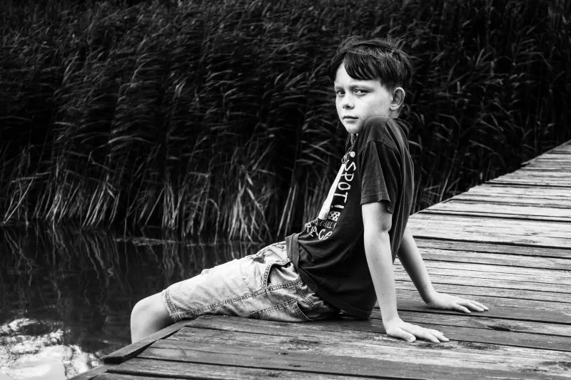 Crying by the Flagpole: Why Homesickness at Camp Is Actually Working in Your Kid's Favor